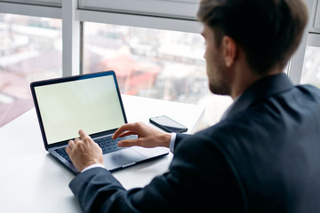 man using digital tablet