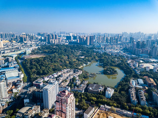 Aerial photography of bustling high-rise buildings in Asian cities and Central Green Park