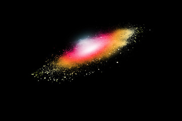 Explosion of colored powder isolated on black background. Abstract colored background. holi festival.