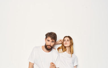 Fototapeta premium young couple in t-shirts chatting