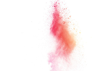 Freeze motion of colorful color powder exploding on white background.  Paint Holi.