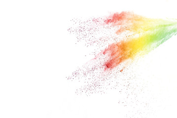 Obraz premium Freeze motion of colorful color powder exploding on white background. Paint Holi.