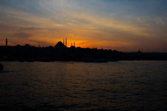 View of Istanbul city and the Golden Horn waterway (Altın Boynuz or Halic) in the evening. Sunset in Istanbul, Turkey