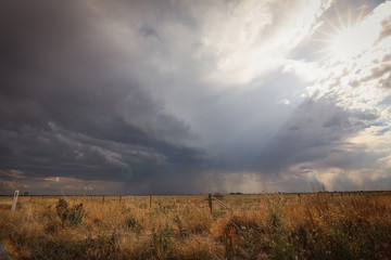 Stormy skies over rural country farmland 