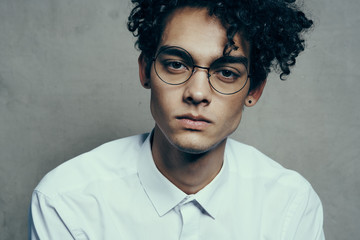 portrait of young man with glasses