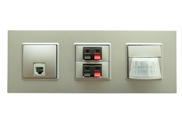 Multifunction outlet with an audio input, motion sensor and network socket
