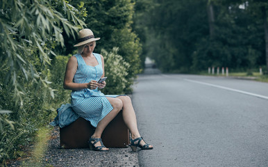 Traveler girl on the road.