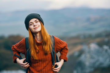 Naklejka premium young woman in mountains