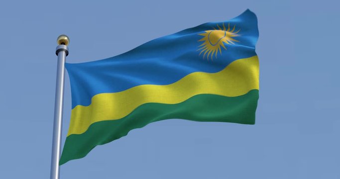 flag of Rwanda blowing in the wind in front of a blue sky