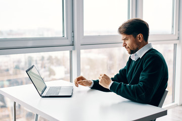 businessman working on laptop in office