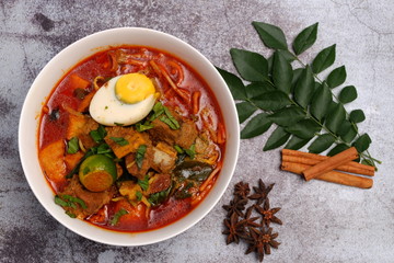 Mutton curry noodle with star anise, cinnamon and curry leaves.