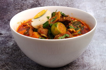 Close up bowl of mutton curry noodle