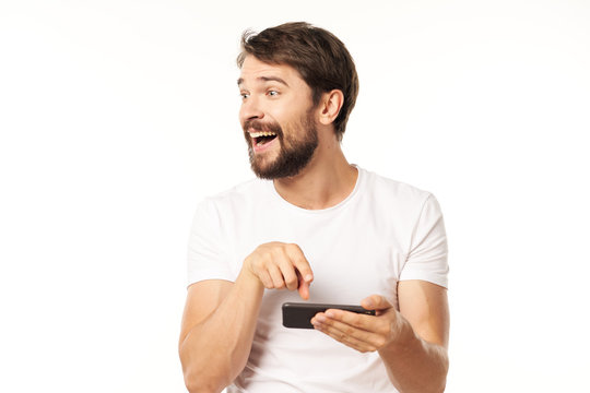 young man texting on mobile phone