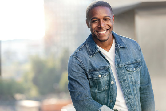 African american commercial male model with perfect smile, handsome charming warm and friendly, lifestyle portrait