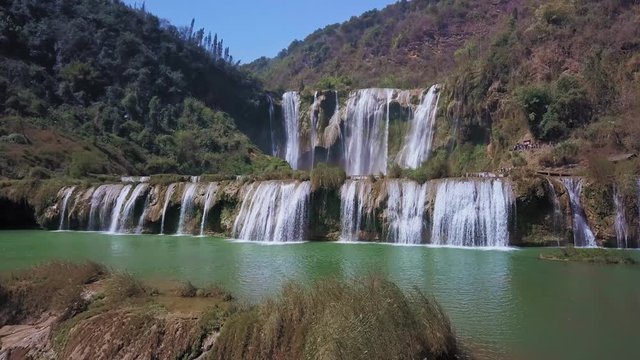 Aerial view drone flight above Jiulong waterfall in Luoping, Yunnan, China
