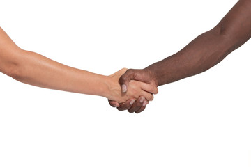 Black and white human hands. A strong handshake