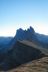 Sunrise landscapes in Seceda with clear blue sky in Dolomites, South Tyrol, Italy