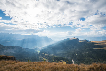 Sunset landscapes in Seceda with clouds and blue sky in Dolomites, South Tyrol, Italy