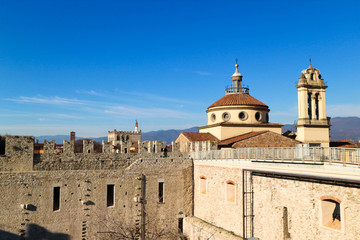 Fototapeta na wymiar View of the medieval church Santa Maria delle Carceri and walls of emperor Ferdinand castle, Prato, Tuscany, Italy