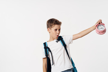 portrait of a boy with backpack