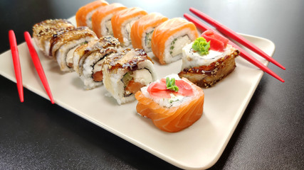 Japanese seafood sushi. Philadelphia and Canada sushi rolls.