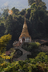 Thai pagoda in the forest.