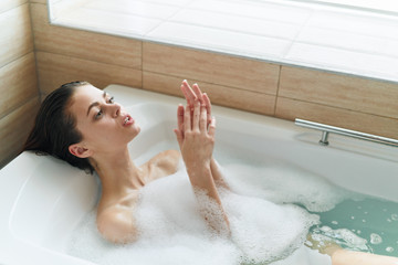 Naklejka premium woman taking a bath