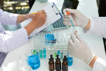 Research and development concept, Laboratory scientist working at lab with test tubes about medicine