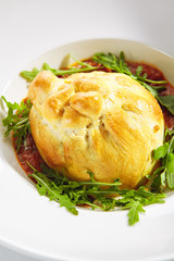 Baked Burrata Cheese with Tomato Sauce and Fresh Arugula Leaves