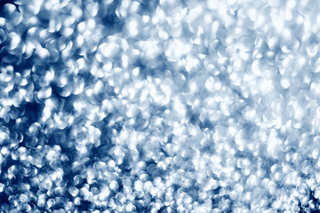 Holiday abstract bokeh background classic blue toned