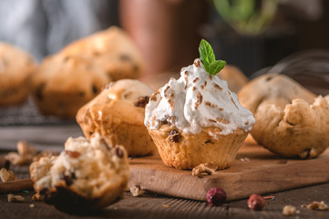 Closeup of bran muffins with raisins on wooden background