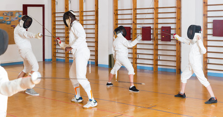 Nice group  practicing fencing techniques