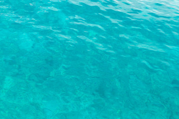 Clear aquamarine ocean water in Tulum, Mexico.