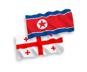 Flags of North Korea and Georgia on a white background