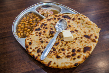 Amritsari Kulcha (Clay-baked stuffed Naan), typical meal of Amritsar, India