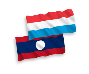 Flags of Laos and Luxembourg on a white background