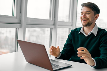 businessman working on his laptop in office