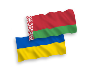 National vector fabric wave flags of Belarus and Ukraine isolated on white background. 1 to 2 proportion.