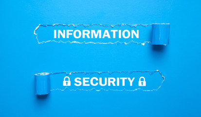 Information Security text with padlock on torn paper.