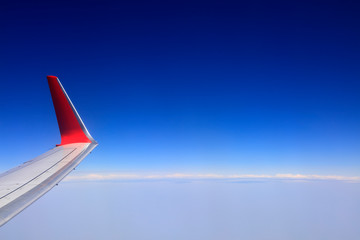 Flight wing in blue sky