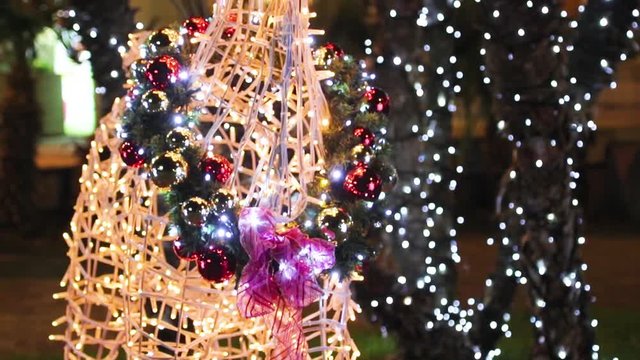 Christmas decorations and lights on the streets of the town of Salo on Lake Grada, Italy. Soft focus. Magic Nights.