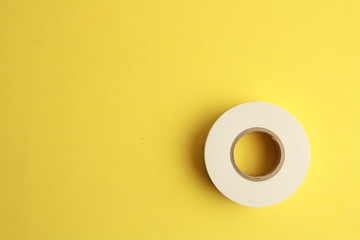 roll of white plastic insulating tape