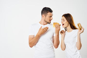 young couple in t-shirts chatting