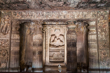 AJANTA, INDIA - FEBRUARY 6, 2017: Interior of a Buddhist cave carved into a cliff in Ajanta, Maharasthra state, India