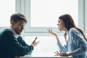 businessman and businesswoman shaking hands