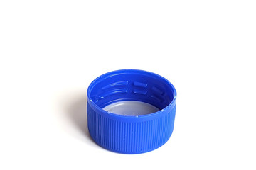 One cover blue color from a bottle of soft drink on white background.