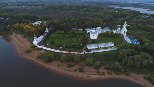 View of the old Staritsky Holy Assumption Monastery on the banks of the Volga. Staritsa, Tver region. Russia (aerial video)