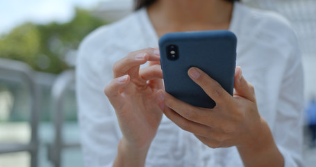 Work everywhere at outdoor, woman use of mobile phone