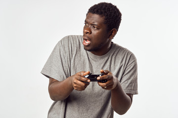 man with joystick playing video game