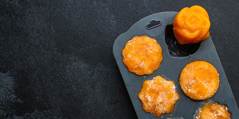 frozen puree orange pumpkin or carrot (preparation, silicone mold, vegetable puree mashed, convenience food) menu concept. food background. top view. copy space